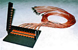 Electronic component vibration test fixture.